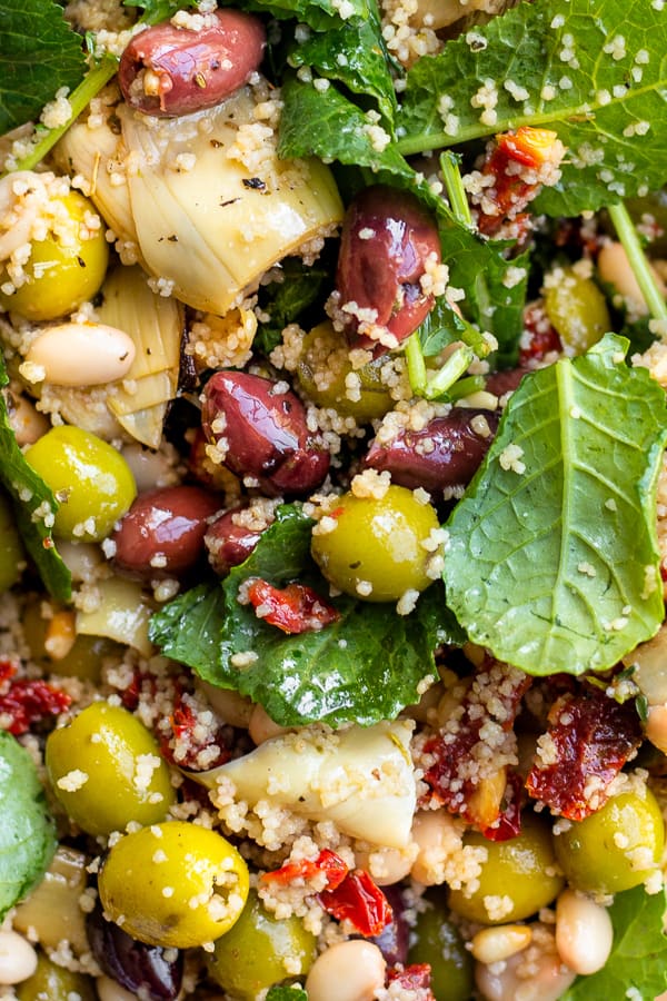a close up of the antipasto couscous salad