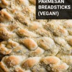 a line of braided rosemary parmesan breadsticks