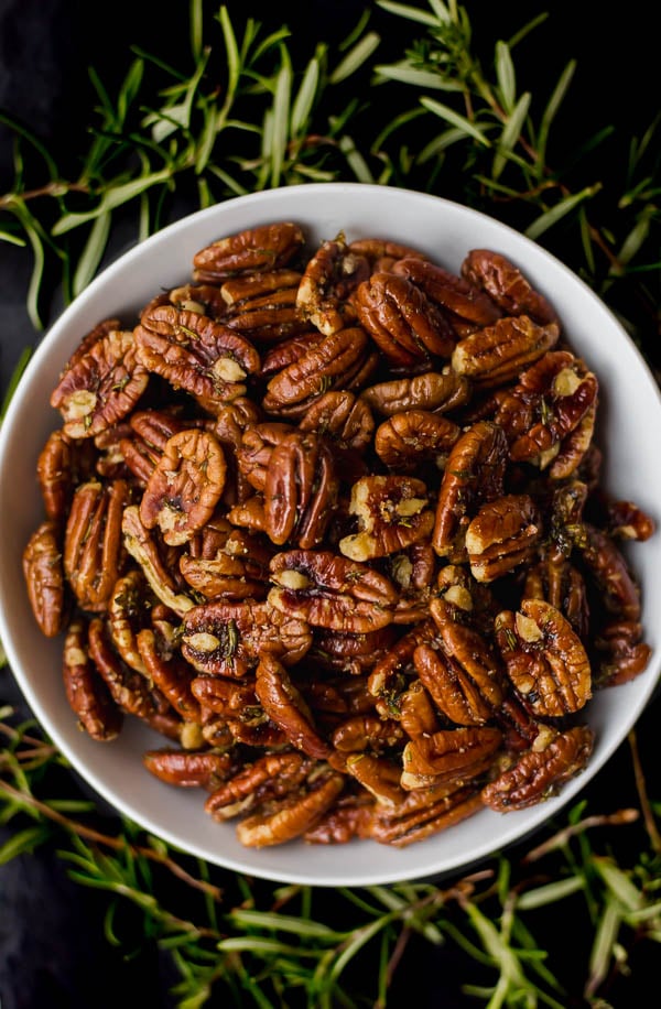 Brown Sugar Herb Pecans: are such a simple and delicious recipe! Perfectly herby and just a little bit sweet for an addictive holiday snack! Naturally vegan and gluten free. || fooduzzi.com recipe