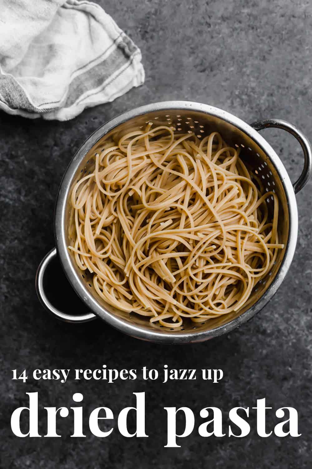 a colander filled with boiled spaghetti