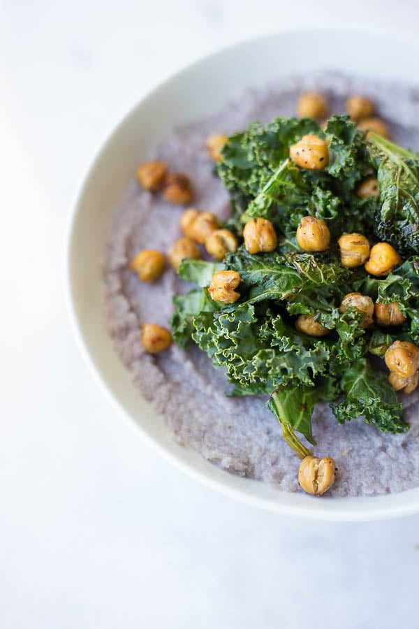 Easy Mashed Cauliflower with Kale and Chickpeas: A delicious 30-minute meal that's gluten free, vegan, and healthy! Creamy mashed cauliflower is topped with garlicky balsamic kale and roasted chickpeas! || fooduzzi.com recipes