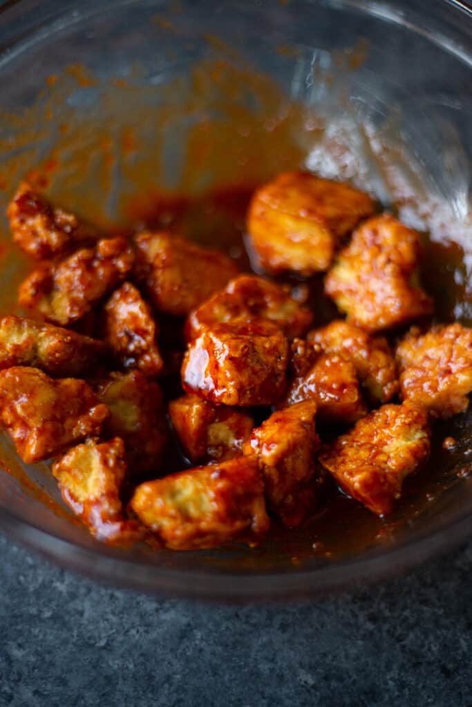 gochujang maple tofu nuggets in a glass bowl