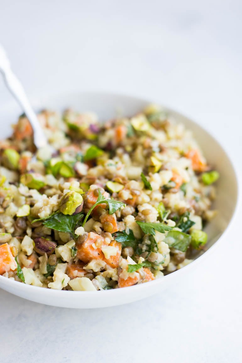 Cauliflower, Sweet Potato, & Herb Salad: full of fresh flavors and textures! Naturally vegan & gluten free, it's full of veggies, protein, and herbs! || fooduzzi.com recipe