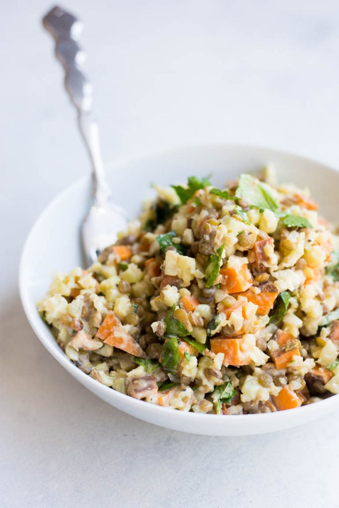 Cauliflower, Sweet Potato, & Herb Salad: full of fresh flavors and textures! Naturally vegan & gluten free, it's full of veggies, protein, and herbs! || fooduzzi.com recipe
