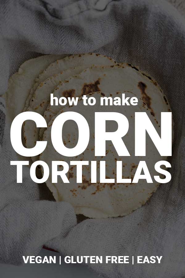 How to Make Corn Tortillas: These homemade tortillas are the best corn tortillas I've ever had! They're naturally gluten free and vegan, and they only require two ingredients! Step-by-step photos included in the post. || fooduzzi.com