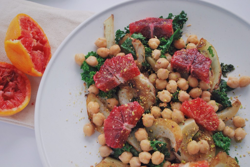 Winter Abundance Salad: All of winter's finest resting on one beautiful plate! This vegan and gluten free delight is full of vitamins and exquisite tastes that will leave you pining for more! Fennel, blood oranges, kale, pistachios, and chickpeas make up this wonderful dish! || fooduzzi.com