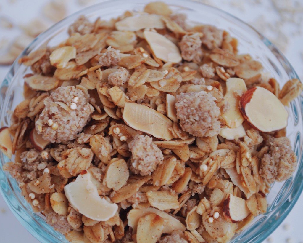 Coconut Coffee Cake Granola: Your house will smell like a buttery rich dessert as you pull the pan of this Coconut Coffee Cake Granola from the oven, when it is really full of fiber, nutrients, and protein! This naturally gluten free and vegan mix will satisfy that summertime yearning! || fooduzzi.com