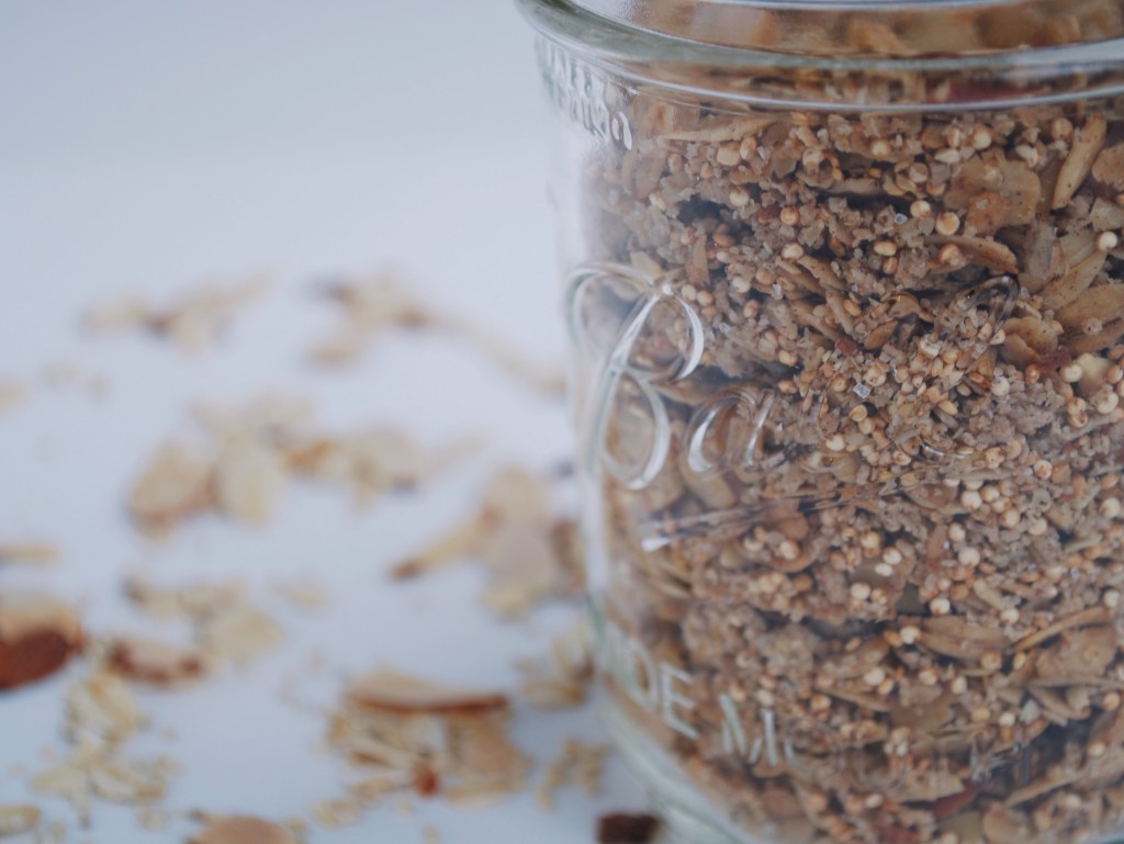 Coconut Coffee Cake Granola: Your house will smell like a buttery rich dessert as you pull the pan of this Coconut Coffee Cake Granola from the oven, when it is really full of fiber, nutrients, and protein! This naturally gluten free and vegan mix will satisfy that summertime yearning! || fooduzzi.com
