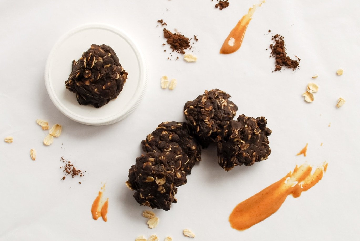 Whole Food No-Bake Cookies: So simple, so peanut buttery, and so addictive! These tasty gluten free and vegan treats take minutes to whip up and only seconds to devour! || fooduzzi.com