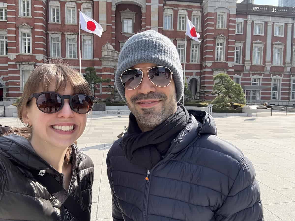 A girl and a boy outside of the Tokyo Station