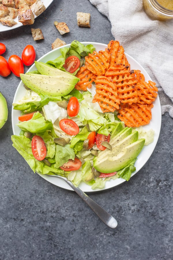 salad with sweet potato waffle fries