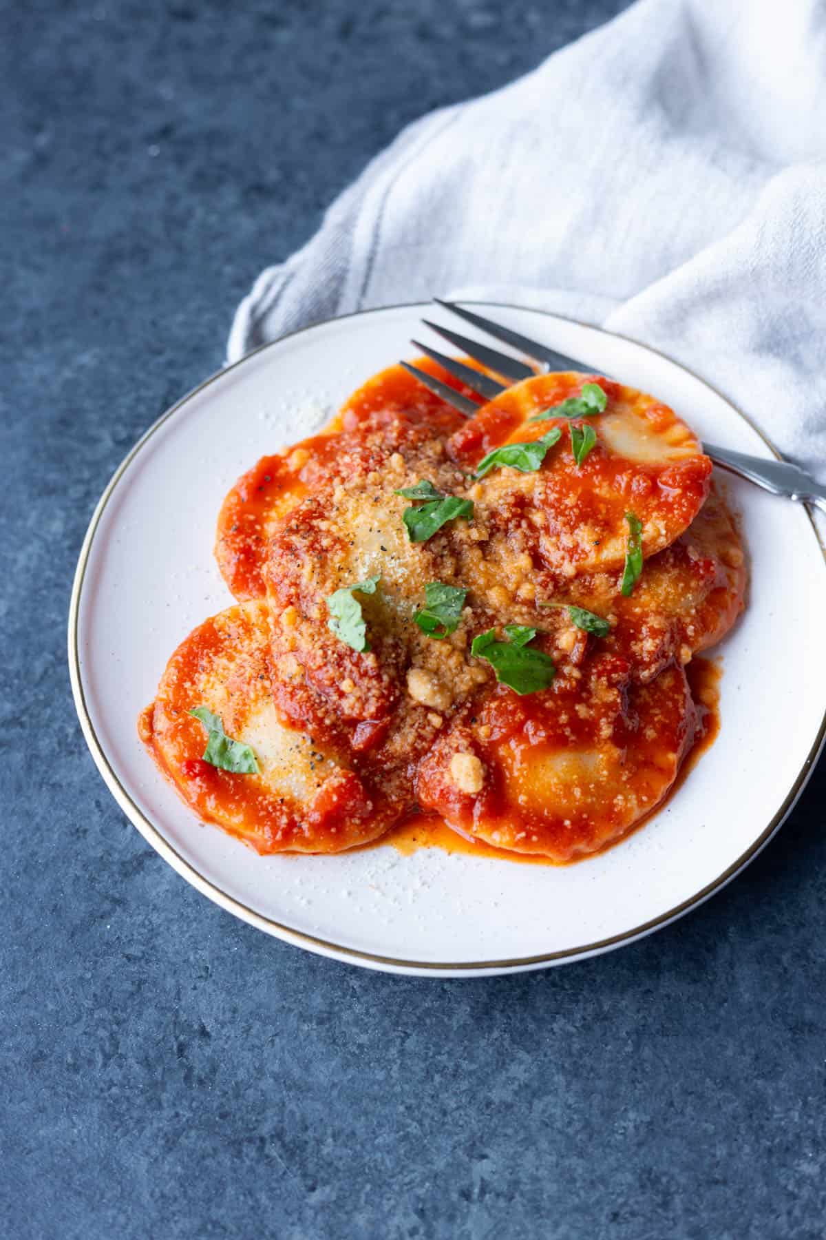 a plate of vegan ricotta ravioli