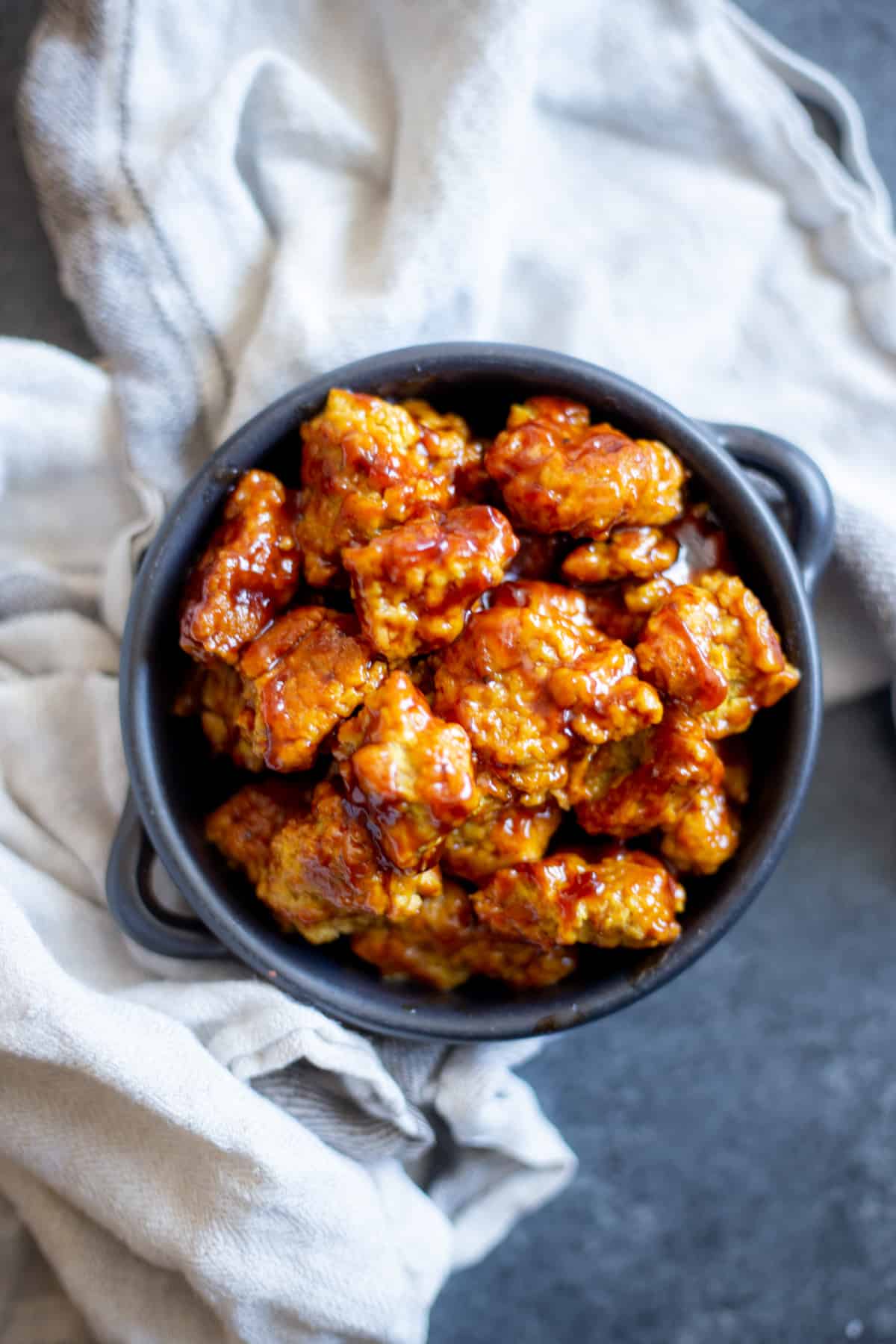 vegan bbq instant pot seitan nuggets in a black bowl