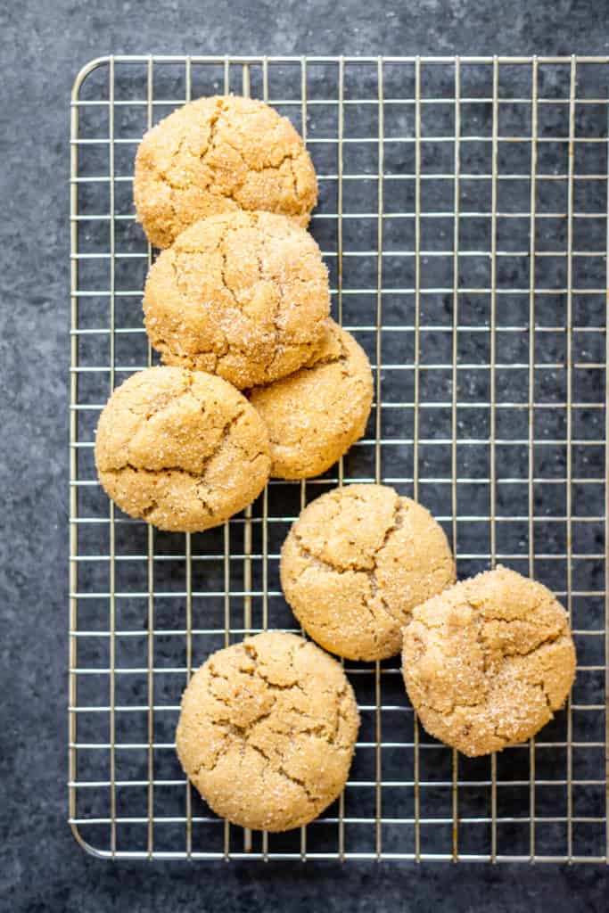 vegan maple pumpkin spice snickerdoodles on a cooling rack